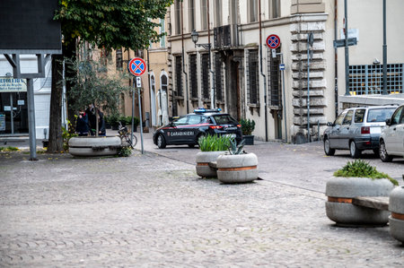 terni, italy actober 17 2020: black gardener who works for the municipality of terniのeditorial素材