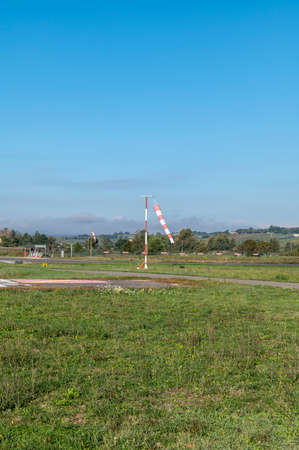 wind indicator for airport near pist on a sunny dayの写真素材