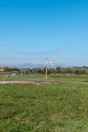 wind indicator for airport near pist on a sunny dayの写真素材