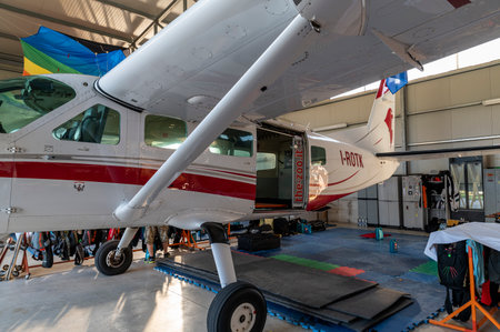 detail of a parachuting plane stopped in a hangarのeditorial素材