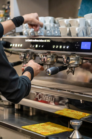 terni, italy october 20 2020: barista preparing coffee at the machineのeditorial素材