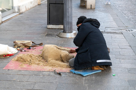 street artist making composition of a dog with sandのeditorial素材