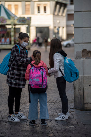 children who go to school with backpack and medical mask cause covid 19のeditorial素材