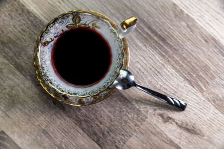 combination of food with tea and biscuits on a wooden table from aboveの写真素材