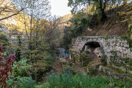ancient ponte del toro along the black river of terni located after the marble waterfallの写真素材