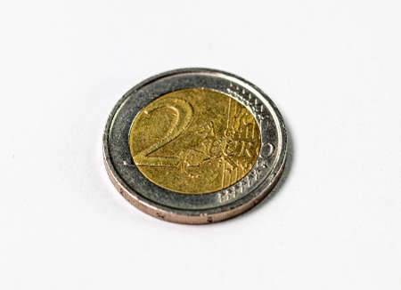 photograph of a two euro coin on a white backgroundの写真素材
