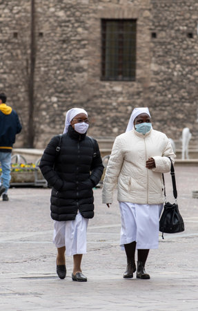 terni, italy february 12 2021: nuns out for a walk in the center of terniのeditorial素材