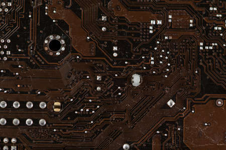 detail of the back of a motherboard with the solder trackの写真素材