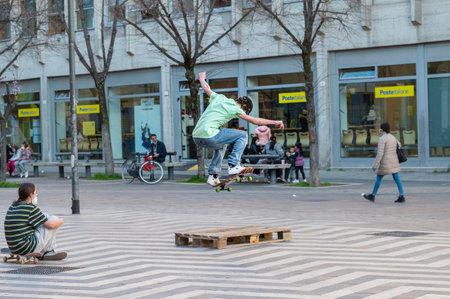 terni, italy march 02 2021: performance with the skateboard in a square with jumpsのeditorial素材