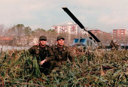 salerno, italy march 02 1980: soldiers with helicopter taking a photo of themselvesのeditorial素材