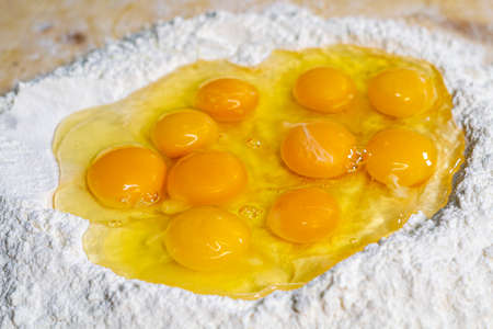 detail roll out the dough with a rolling pin and then make tagliatelle