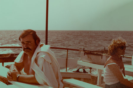 cervia, italy june 10 1978: sea family portrait in the 70sのeditorial素材