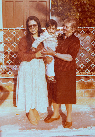 cervia, italy june 10 1978: sea family portrait in the 70s