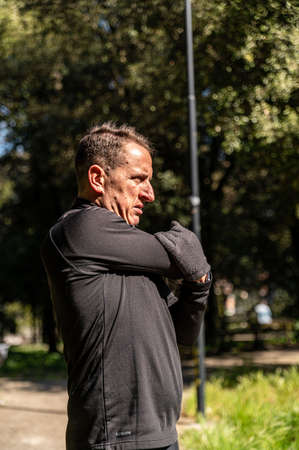 ragzzo does physical activity in the park early in the morningの写真素材