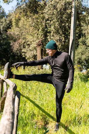 ragzzo does physical activity in the park early in the morningの写真素材