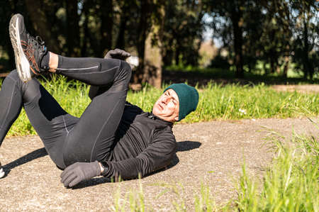 ragzzo does physical activity in the park early in the morningの写真素材