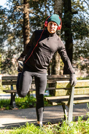 ragzzo does physical activity in the park early in the morningの写真素材
