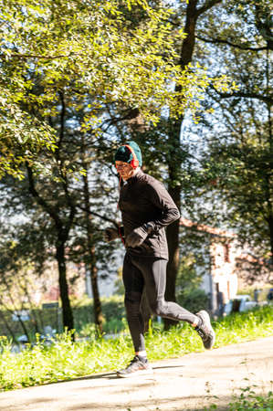 ragzzo does physical activity in the park early in the morningの写真素材