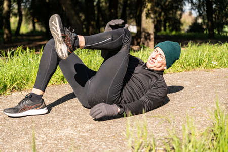 ragzzo does physical activity in the park early in the morningの写真素材