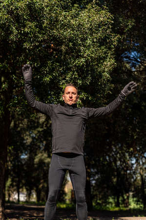 ragzzo does physical activity in the park early in the morningの写真素材