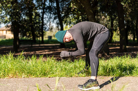 ragzzo does physical activity in the park early in the morningの写真素材
