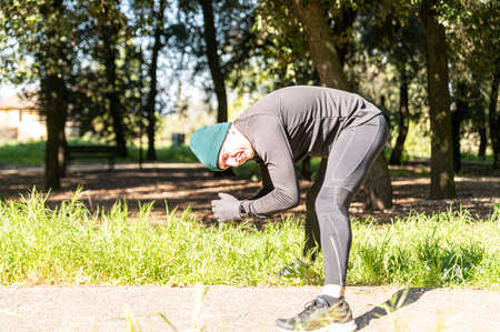 ragzzo does physical activity in the park early in the morningの写真素材
