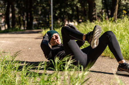 ragzzo does physical activity in the park early in the morningの写真素材