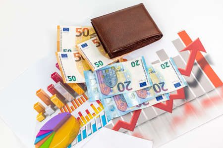20 and 50 euro bills with currency symbol and wallet on the tableの写真素材