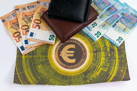 20 and 50 euro banknotes and wallet and cigar on wood backgroundの写真素材