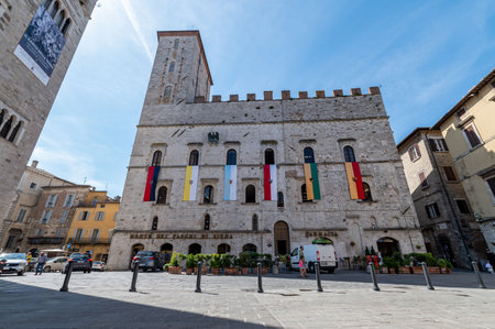 todi, italy june 11 2021: piazza del popolo palace of the bank in the center of todiのeditorial素材