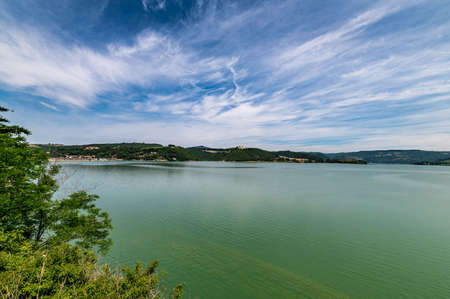 vineyard by the lake for the production of grapes and then to generate wineの写真素材