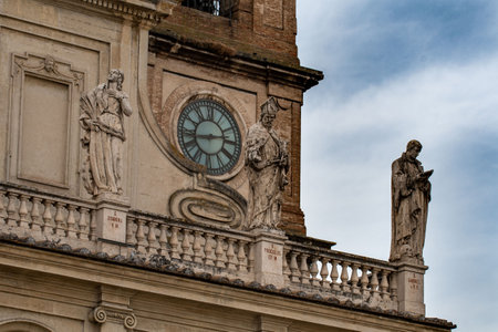 detail of the cathedral of terni bell tower with clockの写真素材