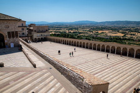 assisi, italy july 11 2021: church of santa chiara in the center of assisiのeditorial素材