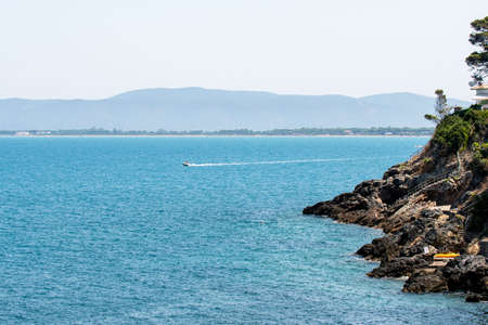 view of a cove in Porto Santo Stefano in the summerの写真素材