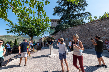 spello, italy august 21 2020: tourists in the beautiful view of Spello while admiring the place