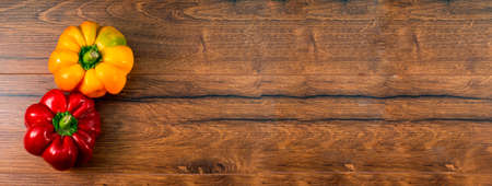 composition of vegetables with cutting board on wooden surfaceの写真素材