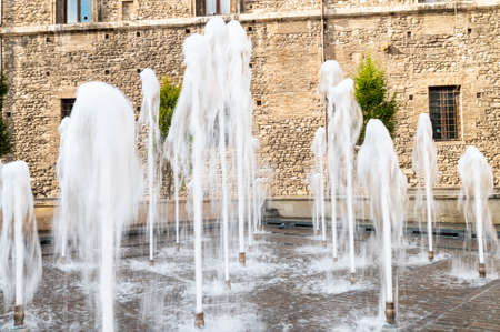 new restored fountain in piazza europa under the town hallの写真素材