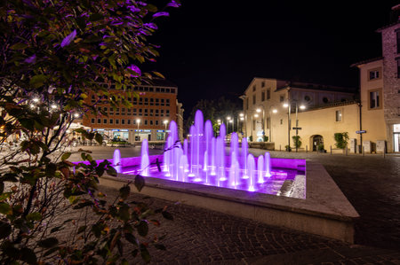 terni, italy october 12 2021: fountain of the town of terni illuminated in pinkのeditorial素材