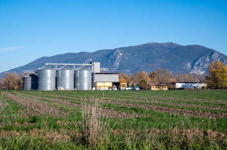 landscape of narni and its chimney of a factory in umbriaの写真素材