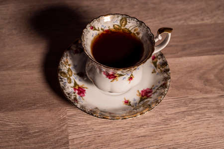 composition cup tea biscuits with sugar bowl on wooden topの写真素材
