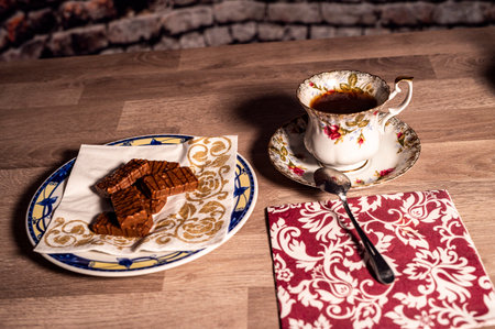 composition cup tea biscuits with sugar bowl on wooden topの写真素材