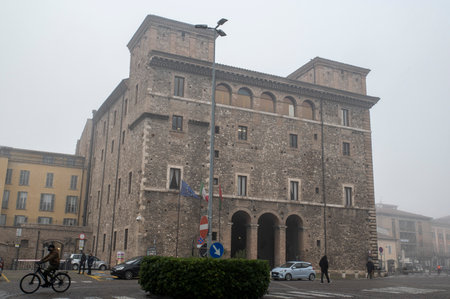 terni,italy january 17 2022:terni square of people and the town called Palazzo Spada with fogのeditorial素材