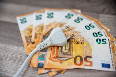 50 euro banknote wad with pin on wooden top