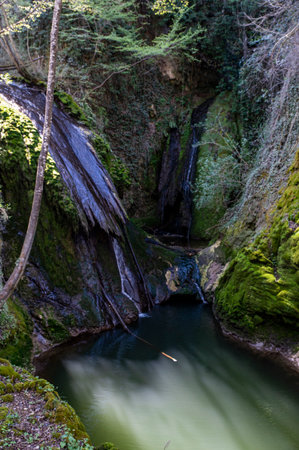 streams with pools of water of the marmore waterfall on a sunny dayの写真素材