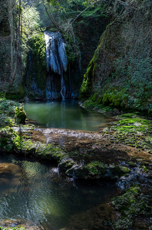 streams with pools of water of the marmore waterfall on a sunny dayの写真素材