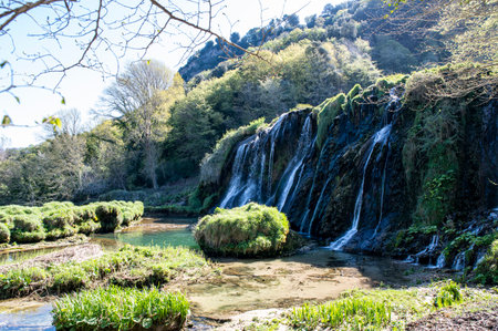 lower fall of the closed marmore waterfall in a sunny dayの写真素材