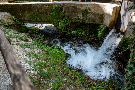 Rasiglia, a village characterized by streams and waterfalls amidst the buildingsの写真素材