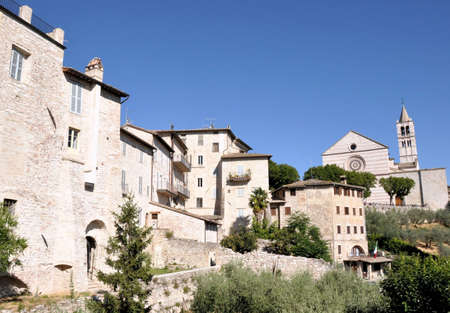 View of the hill town of Assisi, Italy and the church of St Clareの写真素材