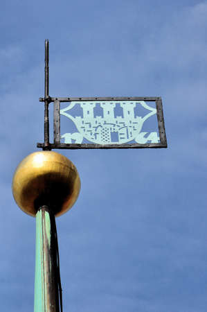 Coat of arms of Torun, symbol on the top of the town hall  spire の写真素材