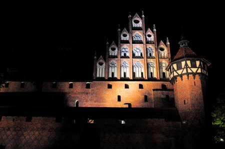 The medieval castle at night. Malbork, Poland.のeditorial素材